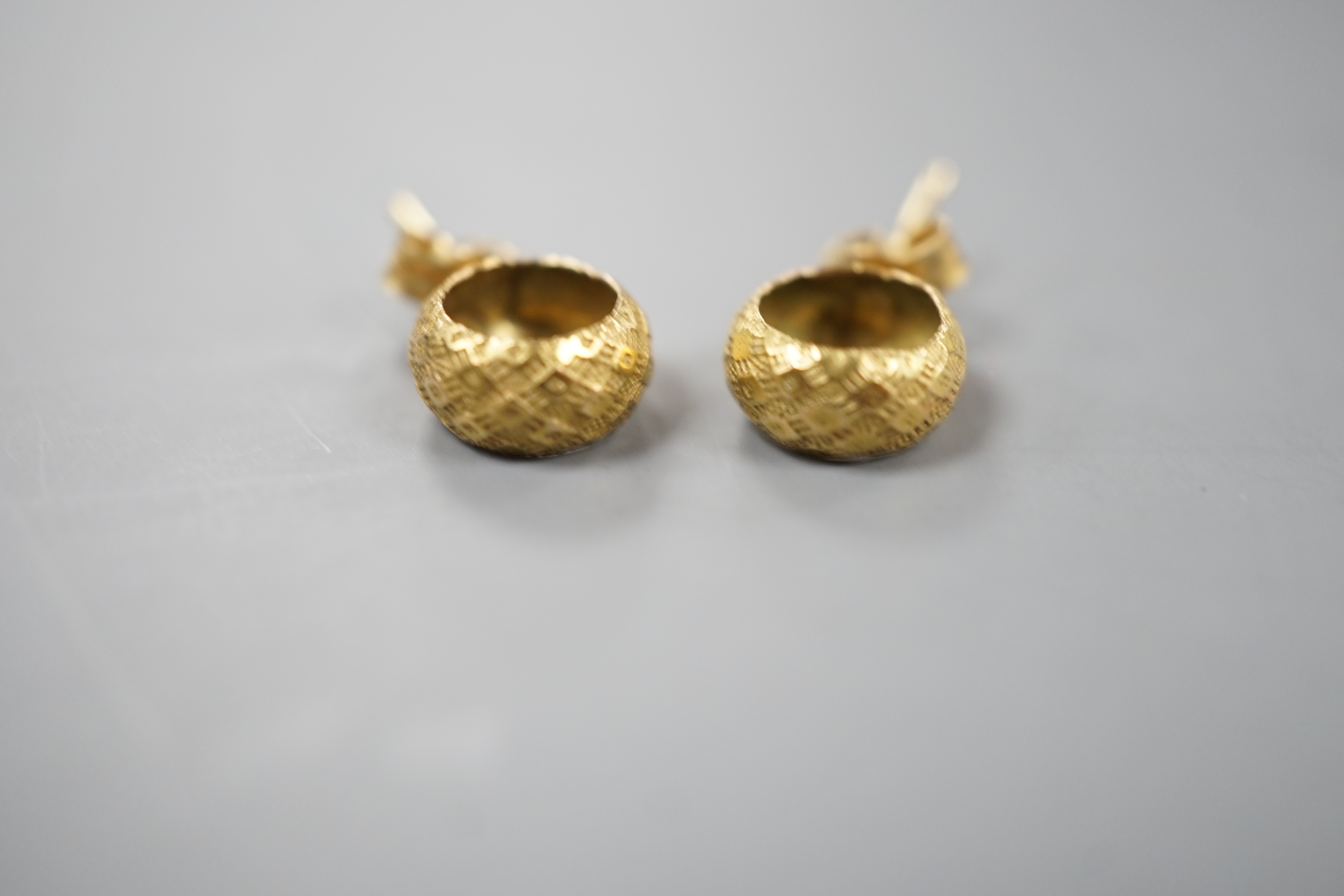 A 9ct guard chain with spherical spacers and a pair of 9k earrings, 11.7 grams.